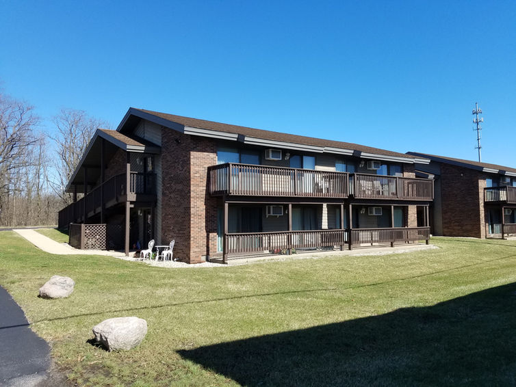 Apartment building for senior citizens. Two-level apartments with an outside balcony.