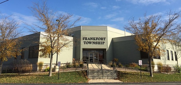 Frankfort Township building exterior with "FRANKFORT TOWNSHIP" sign and steps.